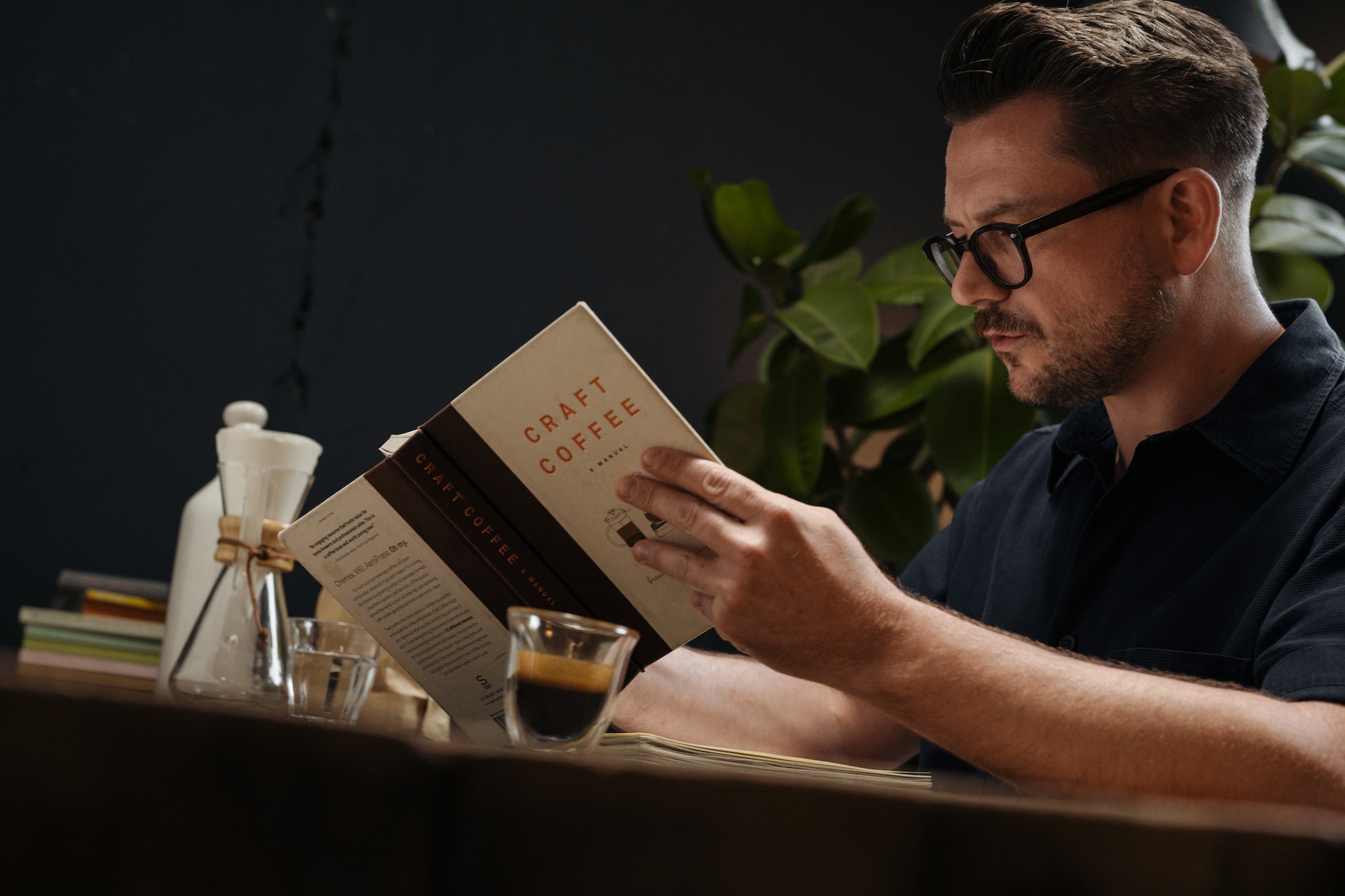 Dan Dunne reading about coffee