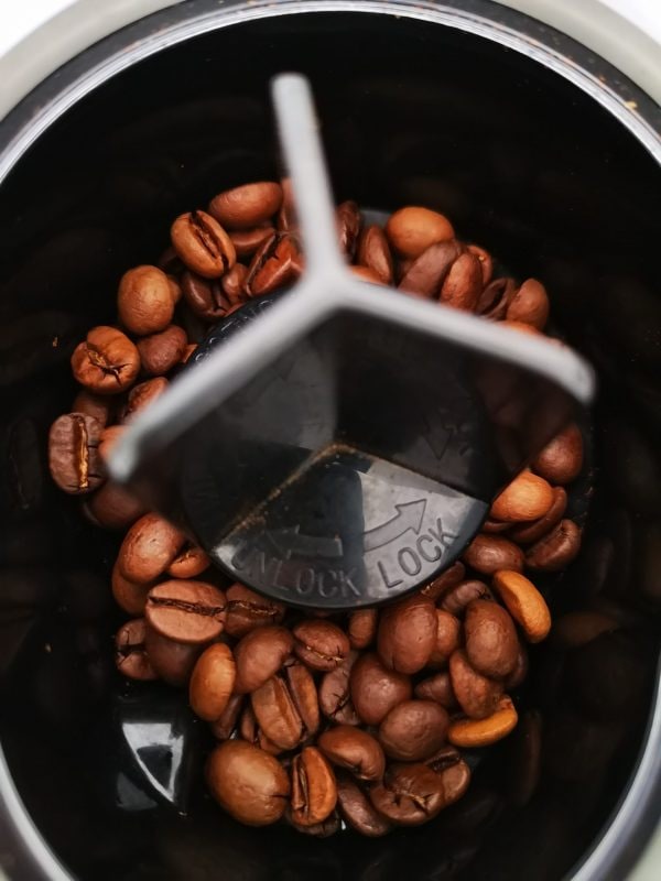 Coffee Beans in a coffee grinder